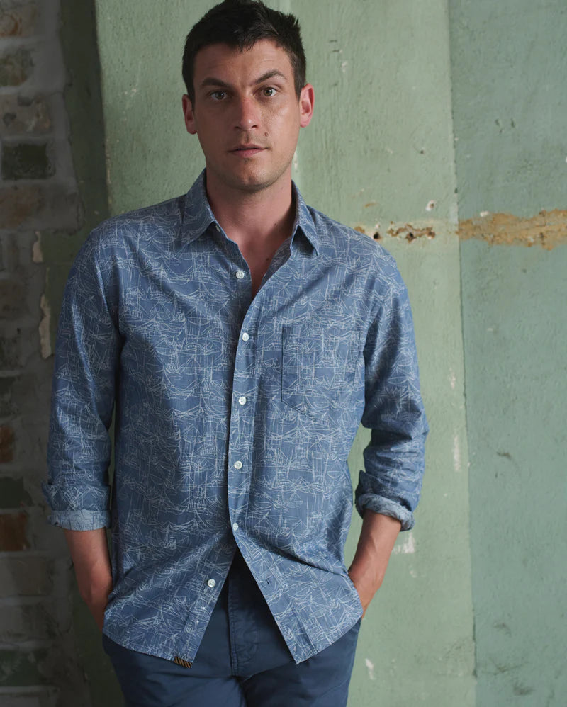 
                      
                        Front view of a man wearing the Melange Shrimp Boat Cypress Shirt by the brand Billy Reid
                      
                    