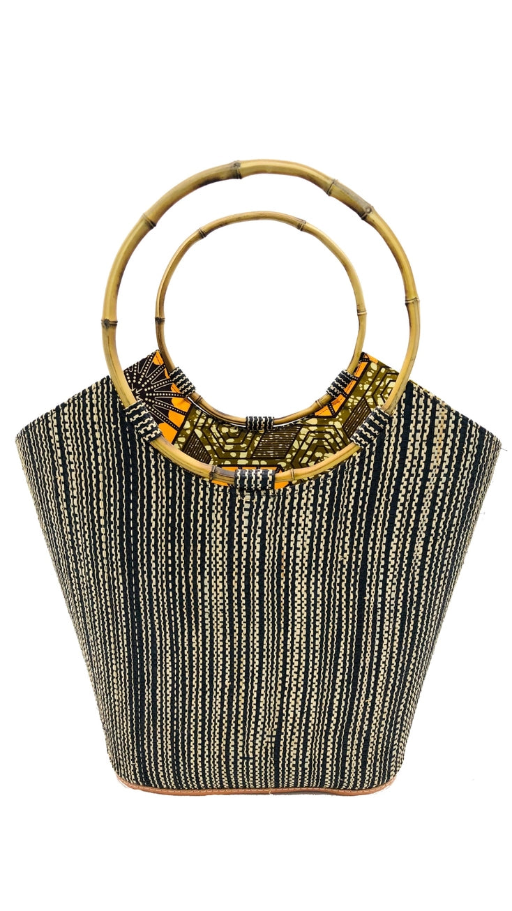 Shebobo's Carmen Solid & Stripes Straw Bucket Bag in the color Black Melange