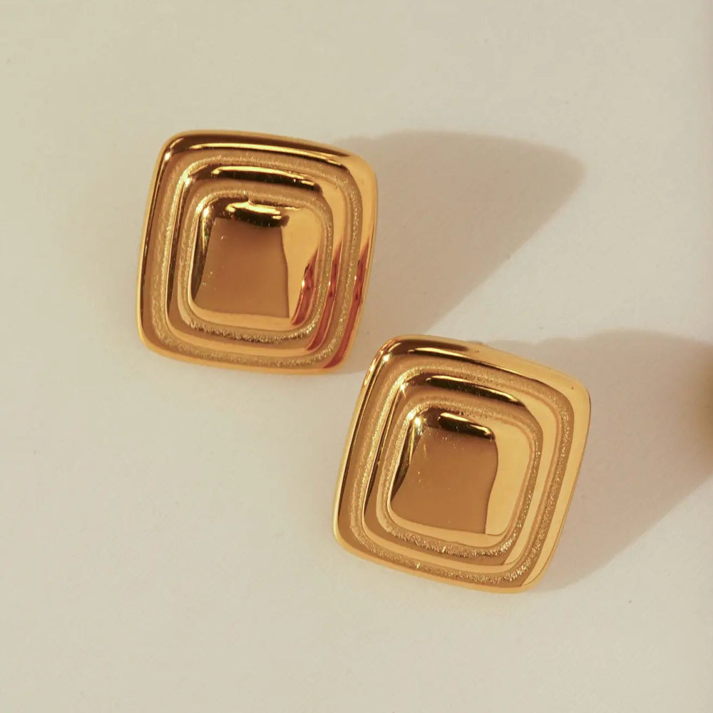 Pair of gold square earrings from KOZAKH