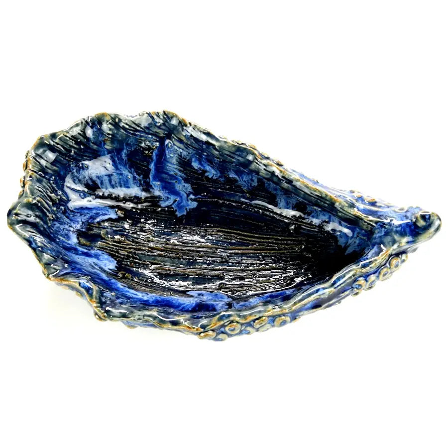 
                      
                        Top view of the Blue Oyster Sculpture by Art Floral Trading
                      
                    