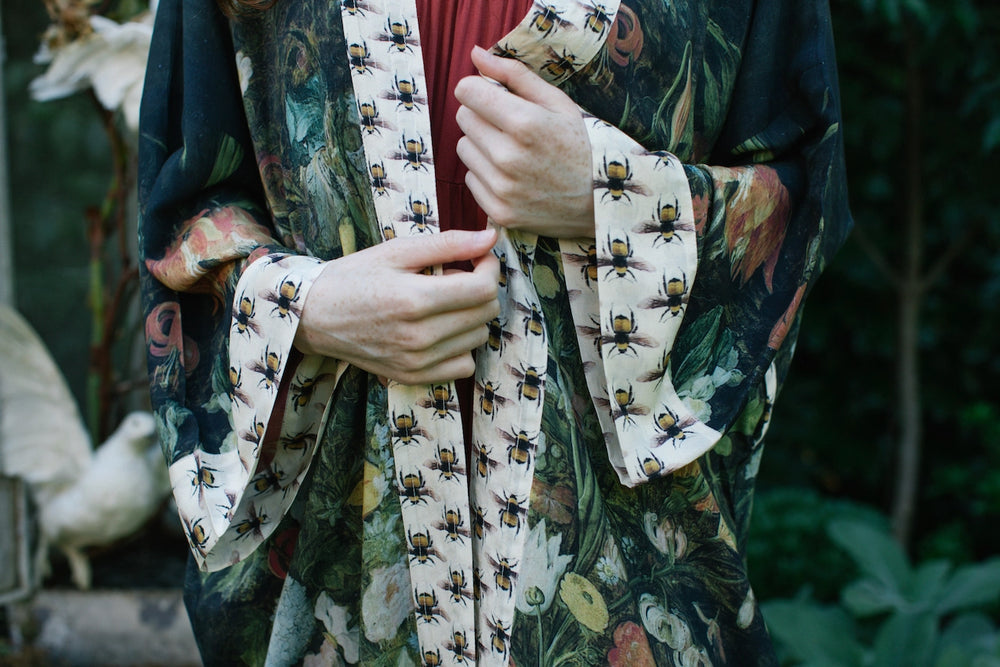 
                      
                        Front design detail on the I Dream in Flowers Bamboo Duster Kimono Robe by Market of Stars
                      
                    