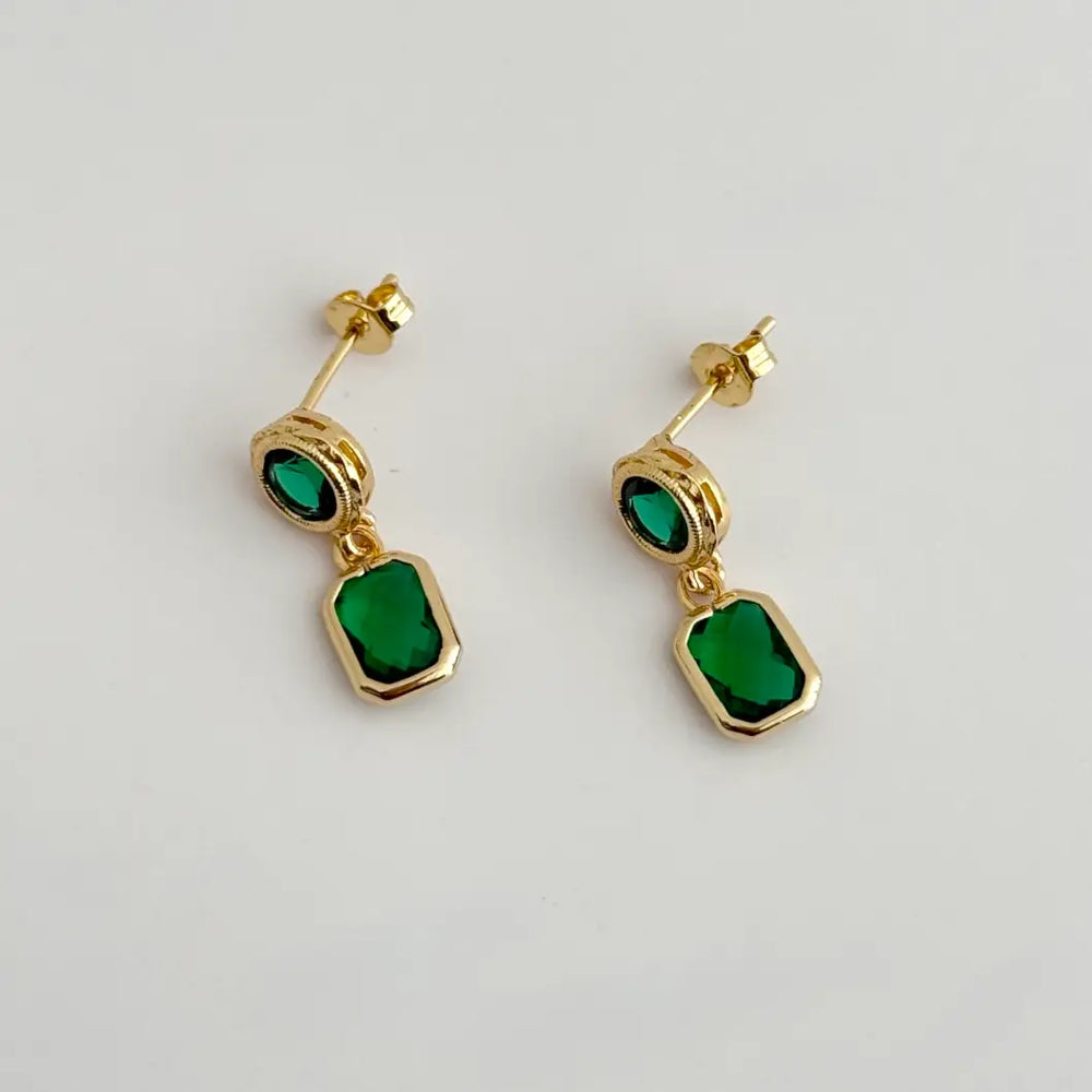 The Jayden Earrings are 14K Gold Filled with emerald CZ stones dainty earrings by Tramps + Thieves, available at Harbour Thread