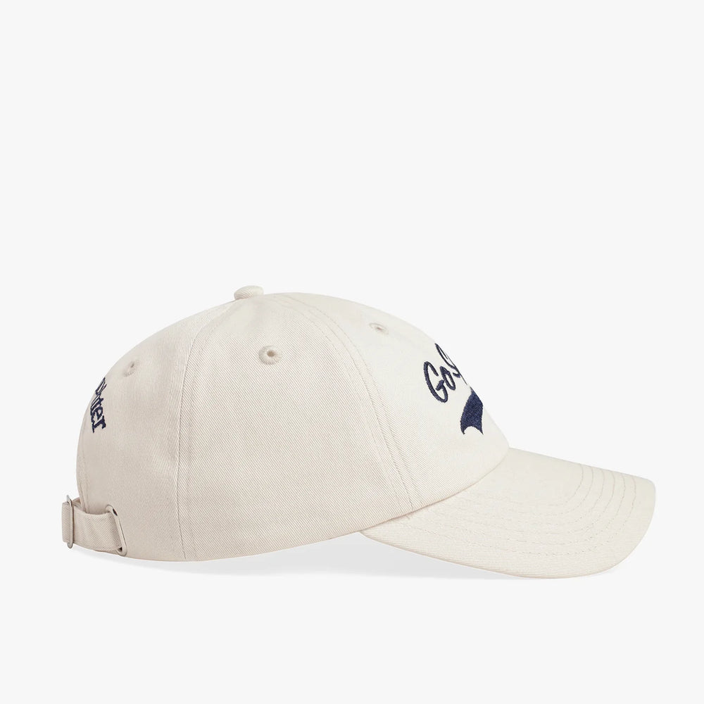
                      
                        Beige cap with embroidered front and 
                      
                    