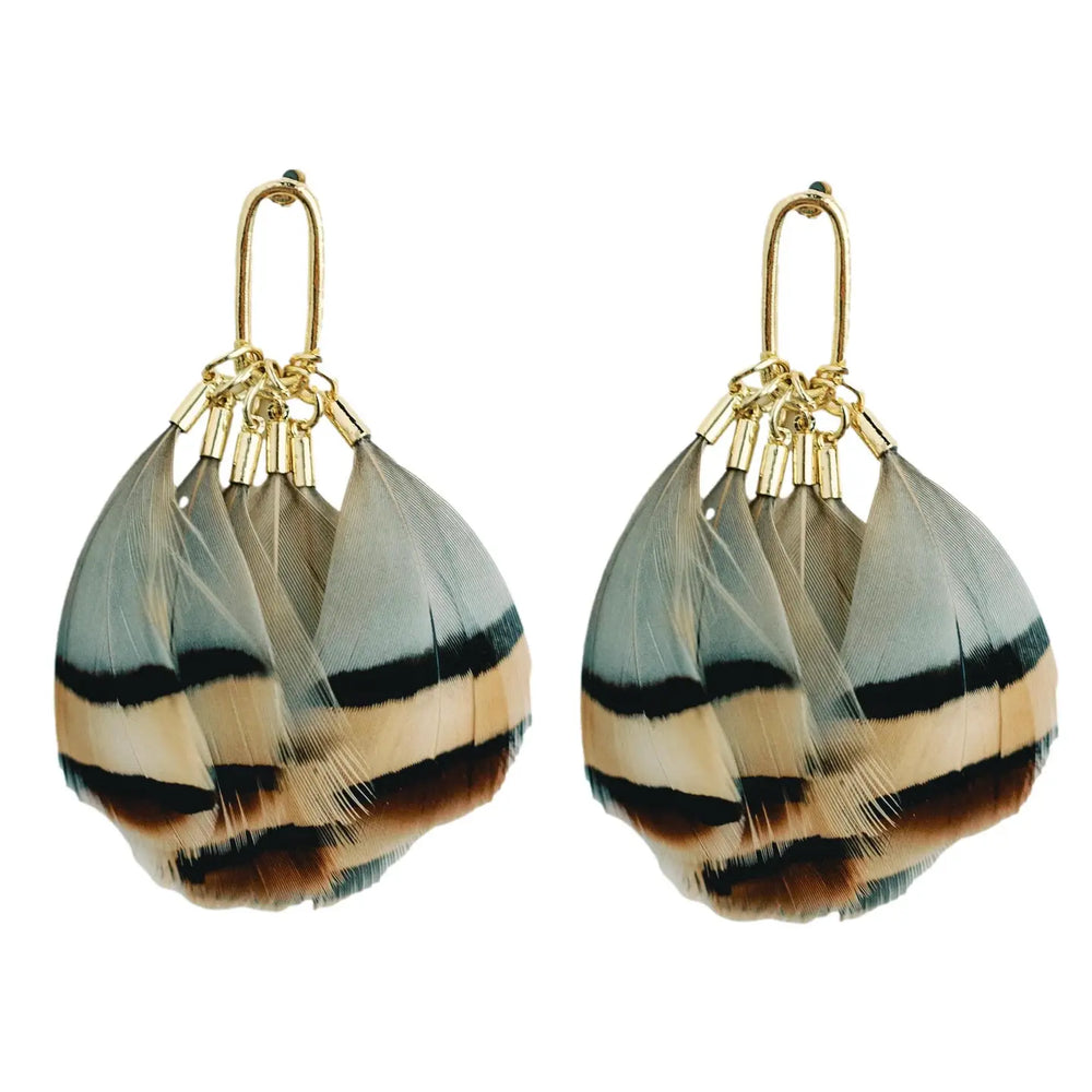 The Brown Striped Feather Statement Tassel Earrings by St. Armands Designs of Sarasota are available to shop at Harbour Thread in Burlington, VT. 