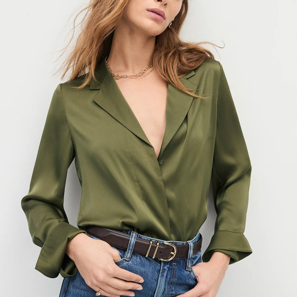 
                      
                        Woman wearing a green blouse from Favorite Daughter
                      
                    