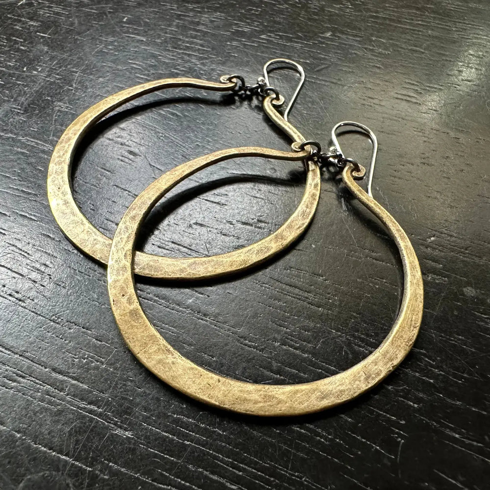 Shop the Brass Torque Earrings by local Vermont maker Jennifer Kahn Jewelry at Harbour Thread women's boutique in Burlington, VT. 