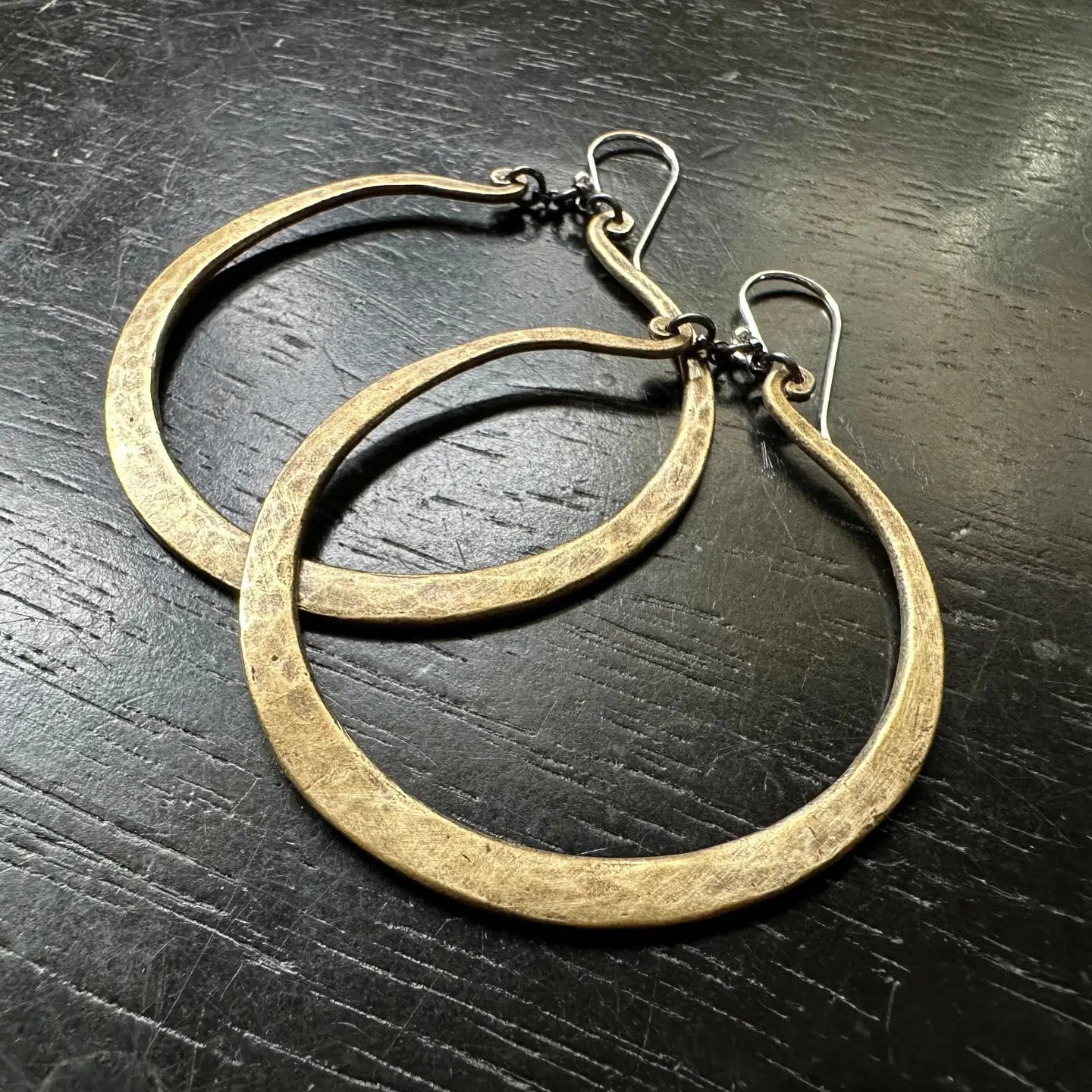 Shop the Brass Torque Earrings by local Vermont maker Jennifer Kahn Jewelry at Harbour Thread women's boutique in Burlington, VT. 