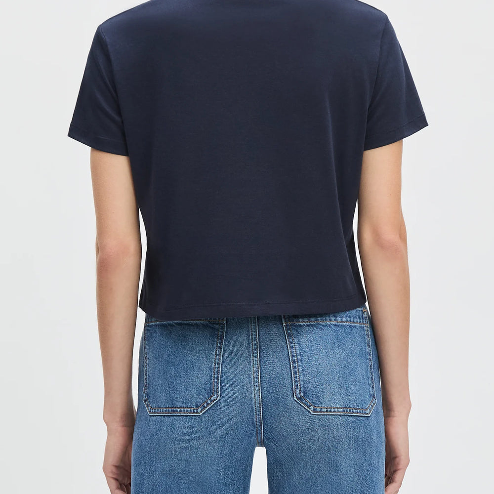 
                      
                        Person wearing a navy blue t-shirt from Favorite Daughter
                      
                    