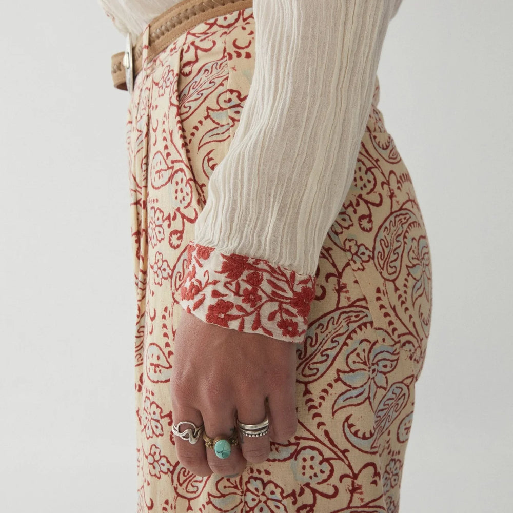 
                      
                        Side detail view of the Maison Hotel Indira Pant in the print Elvis Paisley
                      
                    