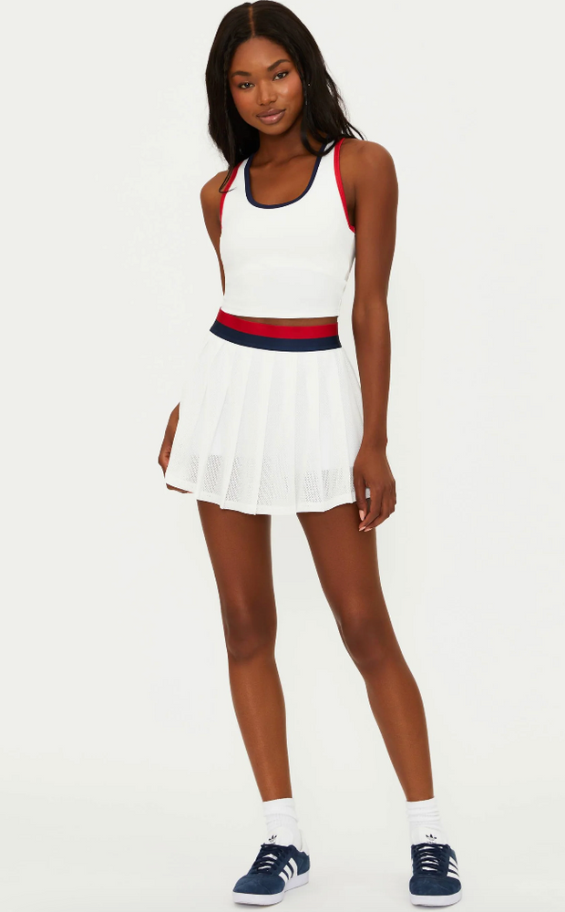 
                      
                        White pleated skort with colorblock waist
                      
                    