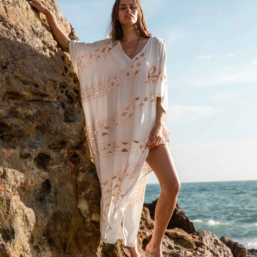 Woman at the beach wearing the Western Bone Commune Kaftan by Jen's Pirate Booty