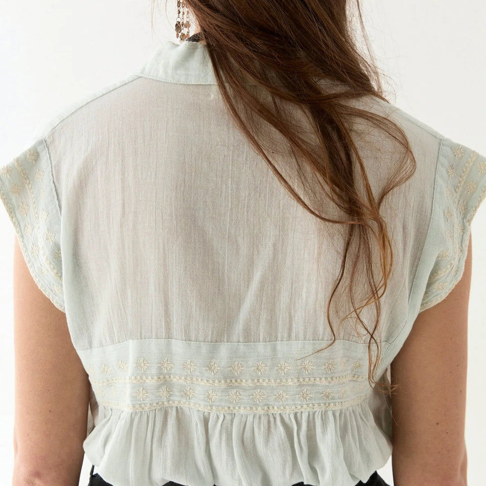 blue embroidered blouse