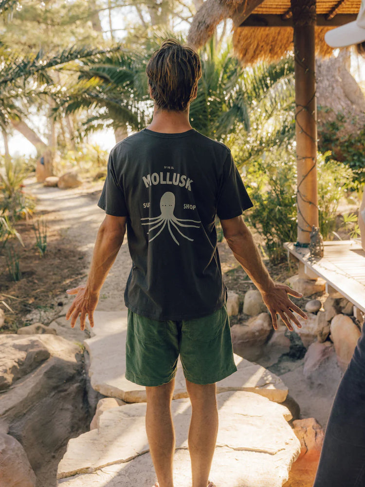 Back of Mollusk's faded black Mollusk Shop Tee