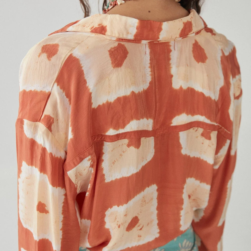 
                      
                        Back view of Maison Hotel's Trapeze Palmira Blouse in the color Terracotta
                      
                    