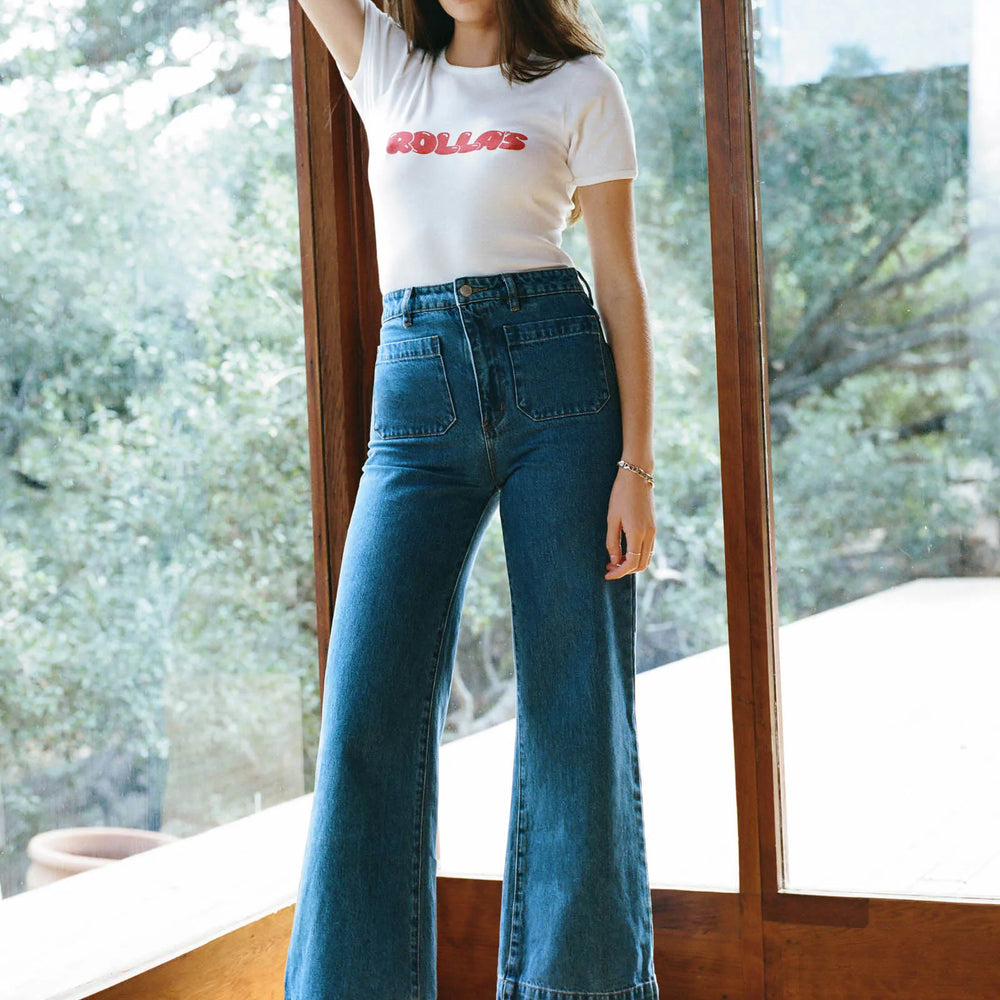 
                      
                        A woman wearing Rolla's Ashley Blue Sailor Jeans
                      
                    