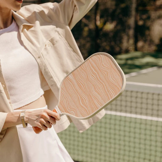 Woman playing with the Recess Moab Pickleball Paddle