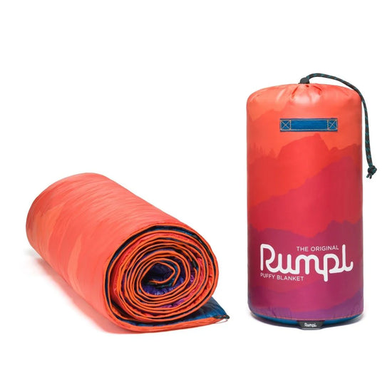 Rumpl's Original Puffy Blanket (1 Person) in the color Sierra Sunset Fade