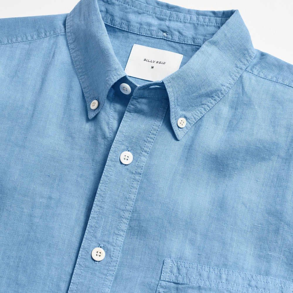 
                      
                        Front collar and closure detail on Billy Reid's French Blue Tuscumbia Linen Button Down Shirt
                      
                    