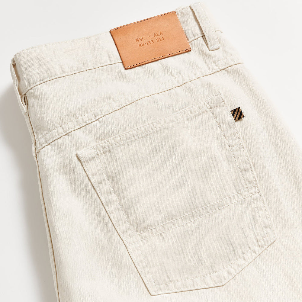 
                      
                        back detail view of the Billy Reid Cotton Linen 5 Pocket Pant in the color Eggshell
                      
                    