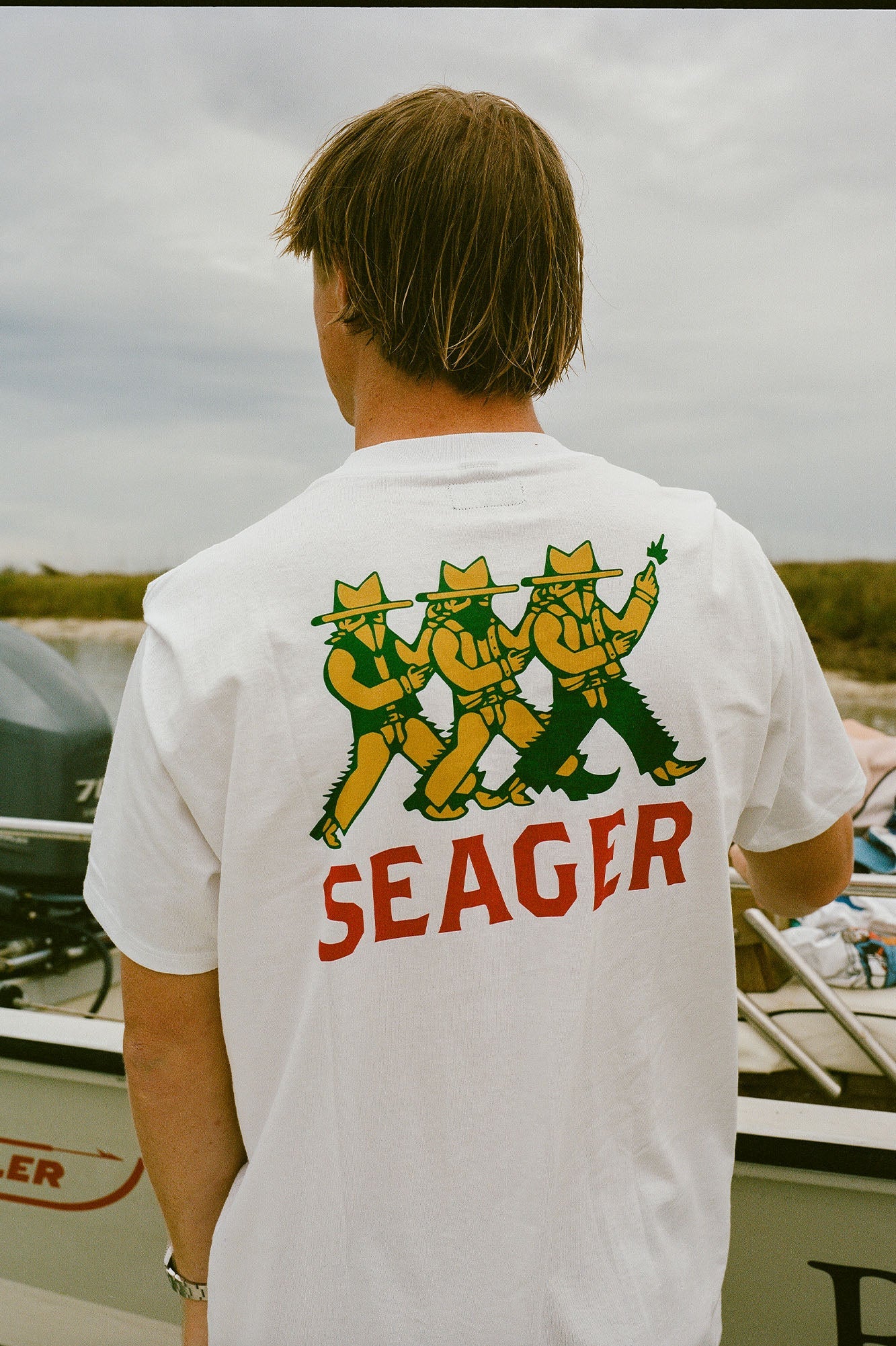 Playful Seager Finger Guns western graphic on short sleeve t-shirt