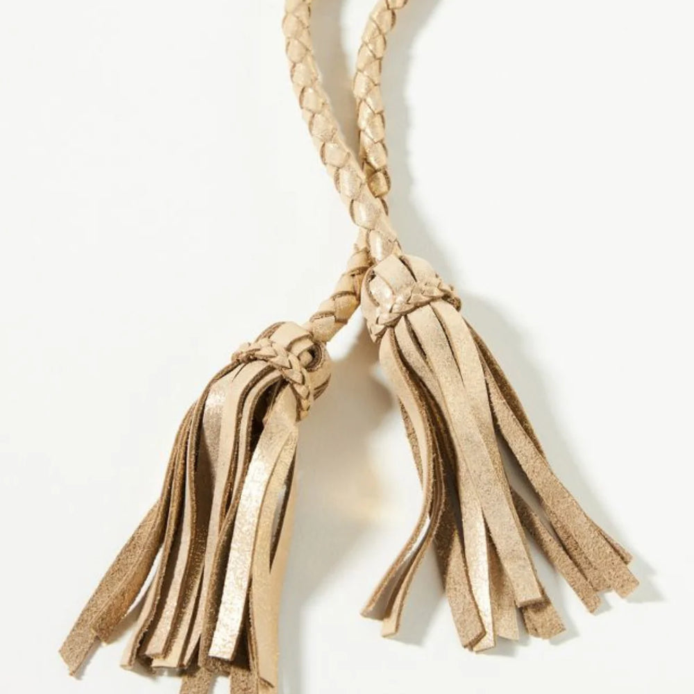 Woven belt with tassel detail