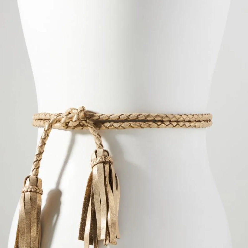 
                      
                        Braided belt with tassels on a mannequin 
                      
                    