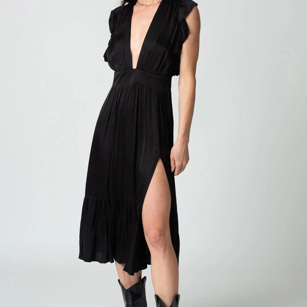 
                      
                        Stillwater's The Jessie Midi Dress in the color Black
                      
                    