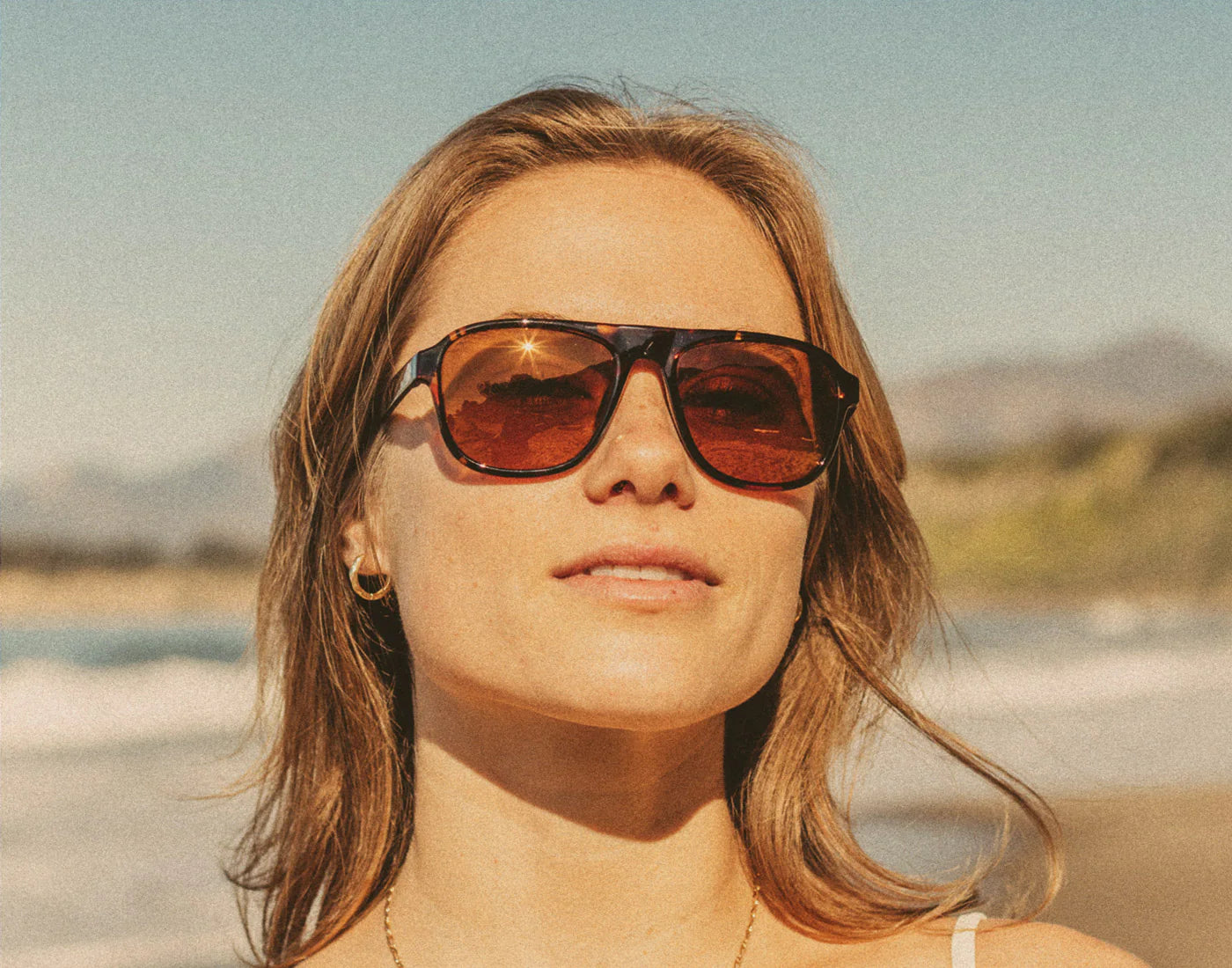 Head into sunny days in style with the Sunski Shoreline Unisex Sunglasses at Harbour Thread boutique in Burlington, VT. 