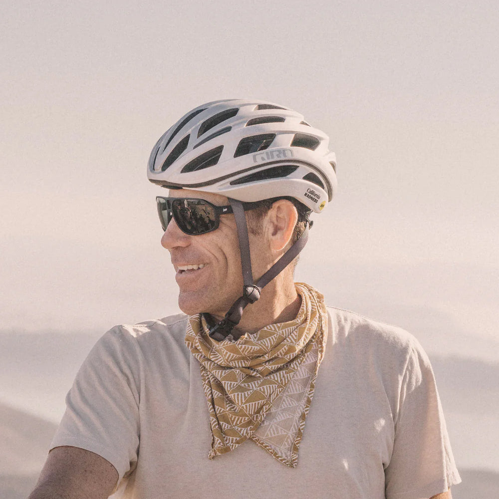 
                      
                        Man wearing the Black Slate Velo Sunglasses by Sunski
                      
                    