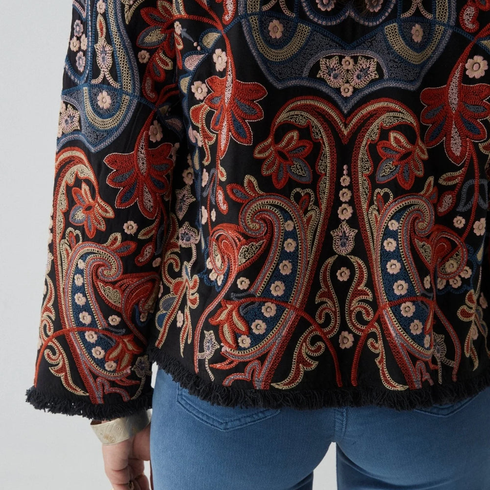 
                      
                        Back and fringe detail on the Suresh Jacket by Maison Hotel
                      
                    