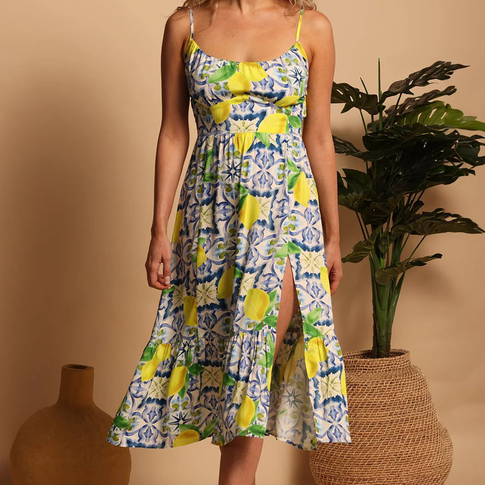 Front view of a woman wearing the Capri Lemons Sydney Midi Dress by Shore