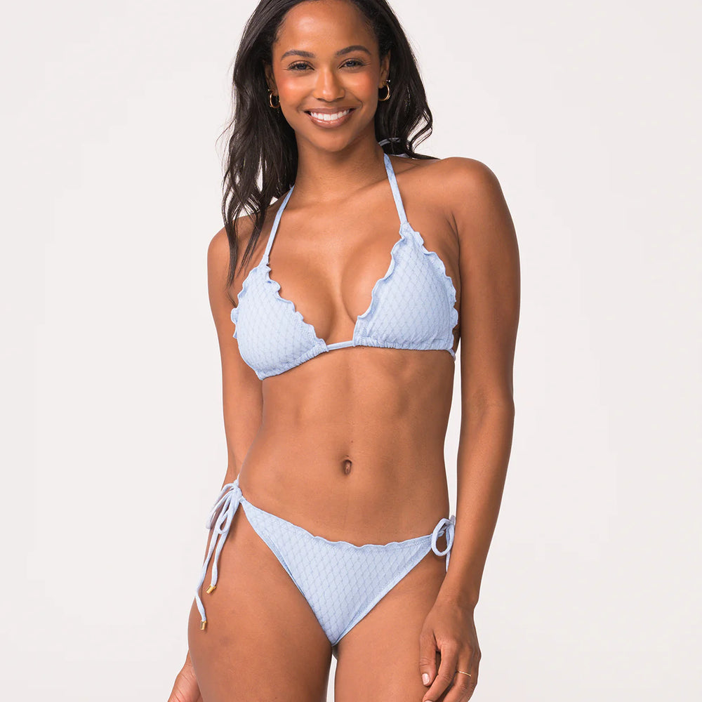 
                      
                        Shop the Tallulah Lettuce Edge Tie Bikini Bottoms by PQ Swim at Harbour Thread. 
                      
                    