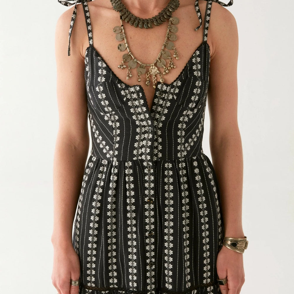
                      
                        Dress with fitted bodice and flowy skirt
                      
                    