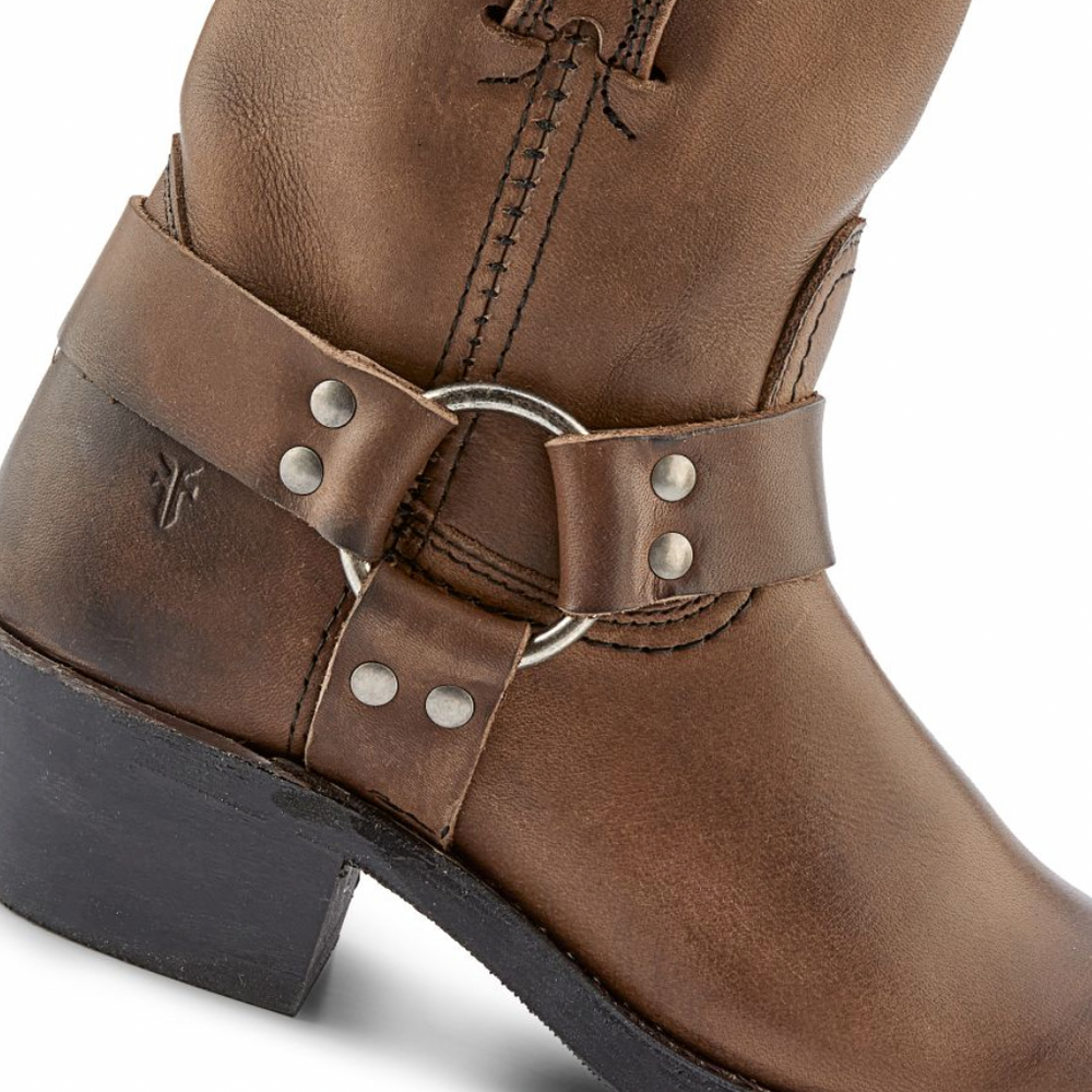 
                      
                        brown leather heeled boot with silver hardware
                      
                    