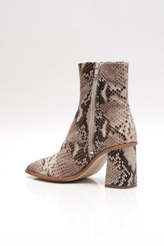 snakeskin heeled boots