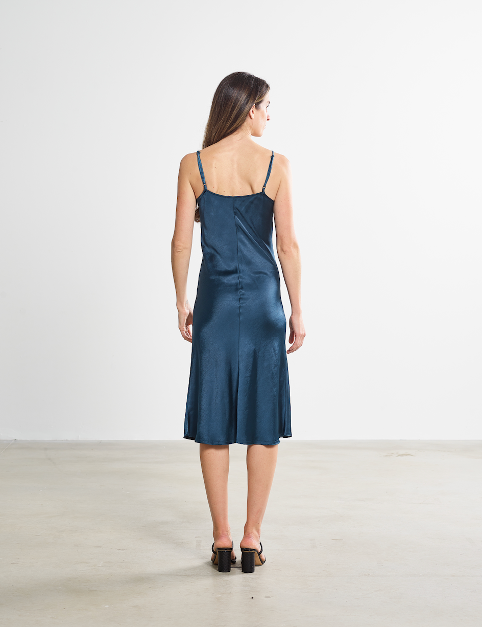 The sawyer versatile slip dress in deep teal color