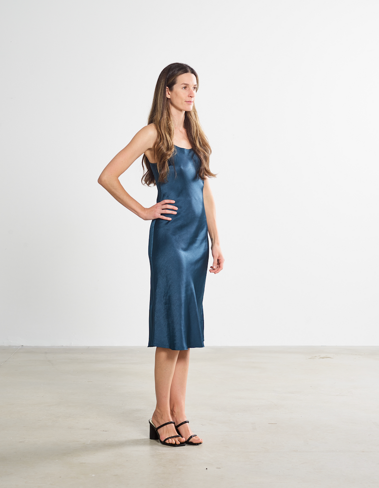 
                      
                        The sawyer women's event midi slip dress in deep teal sold at harbour thread
                      
                    